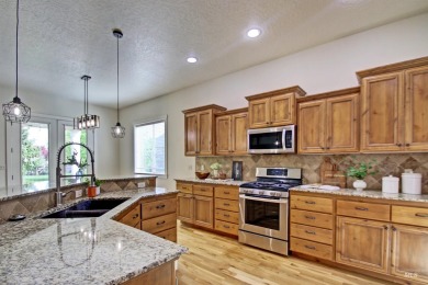 Enjoy a blend of comfort and functionality in this beautiful on Eagle Legacy Golf Course in Idaho - for sale on GolfHomes.com, golf home, golf lot