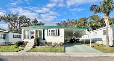 Under contract-accepting backup offers. This beautifully on Fairway Village Golf Course in Florida - for sale on GolfHomes.com, golf home, golf lot