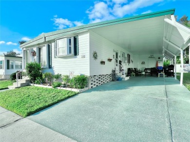 Under contract-accepting backup offers. This beautifully on Fairway Village Golf Course in Florida - for sale on GolfHomes.com, golf home, golf lot
