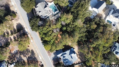 Experience the perfect blend of timeless architecture and on The Currituck Golf Club in North Carolina - for sale on GolfHomes.com, golf home, golf lot