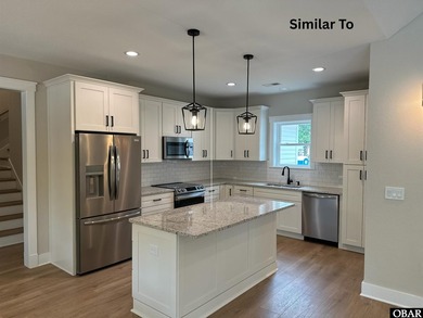 Experience the perfect blend of timeless architecture and on The Currituck Golf Club in North Carolina - for sale on GolfHomes.com, golf home, golf lot