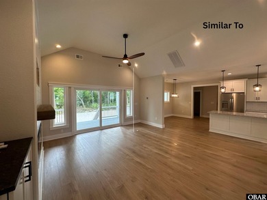 Experience the perfect blend of timeless architecture and on The Currituck Golf Club in North Carolina - for sale on GolfHomes.com, golf home, golf lot