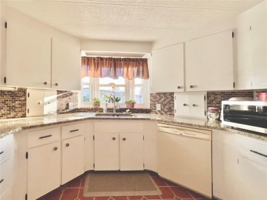 Under contract-accepting backup offers. This beautifully on Fairway Village Golf Course in Florida - for sale on GolfHomes.com, golf home, golf lot