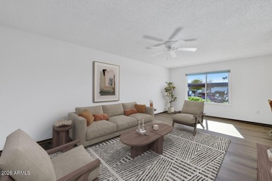 Beautifully updated patio-style townhouse offering modern on PalmBrook Country Club in Arizona - for sale on GolfHomes.com, golf home, golf lot