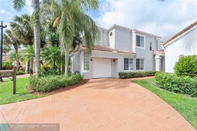 Welcome to this Exquisite 3 Bed/2.5 Bath Single-Family Pool Home on The Boca Country Club in Florida - for sale on GolfHomes.com, golf home, golf lot