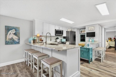 Located in the sought after neighborhood of Seaside Station with on Oyster Bay Golf Links in North Carolina - for sale on GolfHomes.com, golf home, golf lot