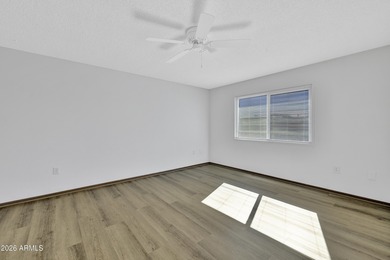 Beautifully updated patio-style townhouse offering modern on PalmBrook Country Club in Arizona - for sale on GolfHomes.com, golf home, golf lot