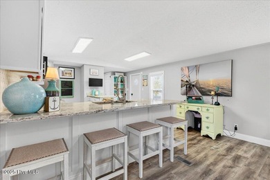 Located in the sought after neighborhood of Seaside Station with on Oyster Bay Golf Links in North Carolina - for sale on GolfHomes.com, golf home, golf lot