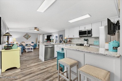 Located in the sought after neighborhood of Seaside Station with on Oyster Bay Golf Links in North Carolina - for sale on GolfHomes.com, golf home, golf lot