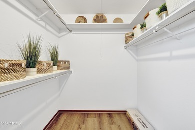 Beautifully updated patio-style townhouse offering modern on PalmBrook Country Club in Arizona - for sale on GolfHomes.com, golf home, golf lot