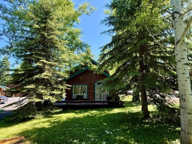 Charming Turnkey Cottage secluded yet near the heart of downtown on McCall Municipal Golf Course in Idaho - for sale on GolfHomes.com, golf home, golf lot