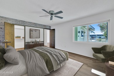 Beautifully updated patio-style townhouse offering modern on PalmBrook Country Club in Arizona - for sale on GolfHomes.com, golf home, golf lot