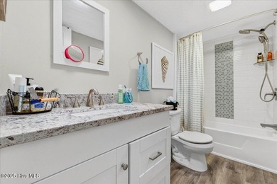 Located in the sought after neighborhood of Seaside Station with on Oyster Bay Golf Links in North Carolina - for sale on GolfHomes.com, golf home, golf lot