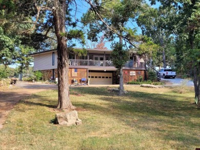 Nestled on two nice lots in the picturesque community of on The Course At Turkey Mountain in Arkansas - for sale on GolfHomes.com, golf home, golf lot