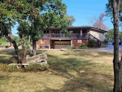 Nestled on two nice lots in the picturesque community of on The Course At Turkey Mountain in Arkansas - for sale on GolfHomes.com, golf home, golf lot