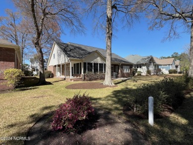 You will love this charming Custom Built 3 bedroom 2 1/4 bath on Sea Trail Golf Resort in North Carolina - for sale on GolfHomes.com, golf home, golf lot