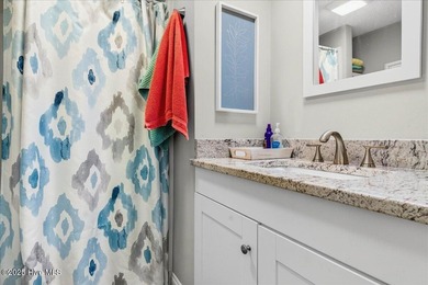 Located in the sought after neighborhood of Seaside Station with on Oyster Bay Golf Links in North Carolina - for sale on GolfHomes.com, golf home, golf lot