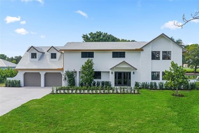 Nestled on a lush  1/2 -acre lot along prestigious Hickory Drive on BallenIsles Golf and Country Club in Florida - for sale on GolfHomes.com, golf home, golf lot
