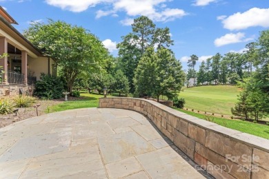Nestled in the heart of the prestigious Tillery Tradition on The Tillery Tradition Country Club in North Carolina - for sale on GolfHomes.com, golf home, golf lot