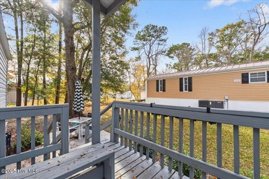 Located in the sought after neighborhood of Seaside Station with on Oyster Bay Golf Links in North Carolina - for sale on GolfHomes.com, golf home, golf lot