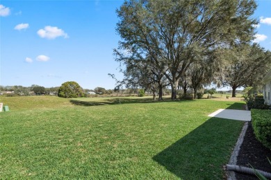 Simply PERFECT in location and design! Situated on a tranquil on Plantation Golf Club in Florida - for sale on GolfHomes.com, golf home, golf lot