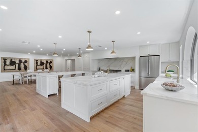 Nestled on a lush  1/2 -acre lot along prestigious Hickory Drive on BallenIsles Golf and Country Club in Florida - for sale on GolfHomes.com, golf home, golf lot