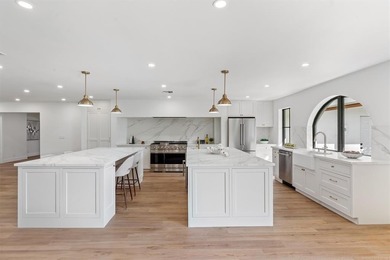 Nestled on a lush  1/2 -acre lot along prestigious Hickory Drive on BallenIsles Golf and Country Club in Florida - for sale on GolfHomes.com, golf home, golf lot