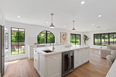 Nestled on a lush  1/2 -acre lot along prestigious Hickory Drive on BallenIsles Golf and Country Club in Florida - for sale on GolfHomes.com, golf home, golf lot