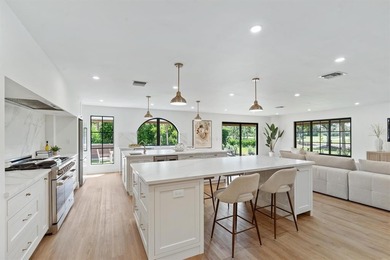 Nestled on a lush  1/2 -acre lot along prestigious Hickory Drive on BallenIsles Golf and Country Club in Florida - for sale on GolfHomes.com, golf home, golf lot