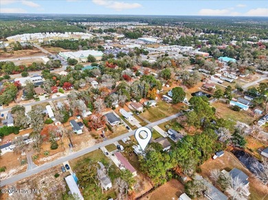 Located in the sought after neighborhood of Seaside Station with on Oyster Bay Golf Links in North Carolina - for sale on GolfHomes.com, golf home, golf lot