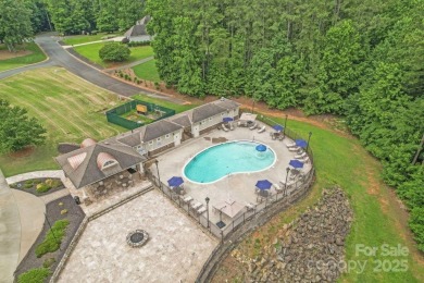 Nestled in the heart of the prestigious Tillery Tradition on The Tillery Tradition Country Club in North Carolina - for sale on GolfHomes.com, golf home, golf lot