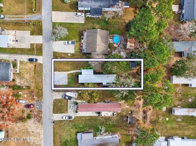 Located in the sought after neighborhood of Seaside Station with on Oyster Bay Golf Links in North Carolina - for sale on GolfHomes.com, golf home, golf lot