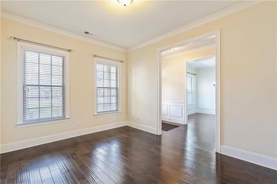 Welcome to 6857 Louis Drive, a beautiful all-brick home located on Canongate At Heron Bay in Georgia - for sale on GolfHomes.com, golf home, golf lot