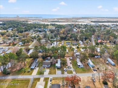 Located in the sought after neighborhood of Seaside Station with on Oyster Bay Golf Links in North Carolina - for sale on GolfHomes.com, golf home, golf lot