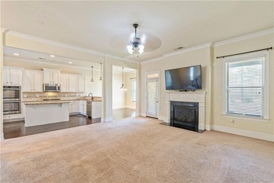 Welcome to 6857 Louis Drive, a beautiful all-brick home located on Canongate At Heron Bay in Georgia - for sale on GolfHomes.com, golf home, golf lot