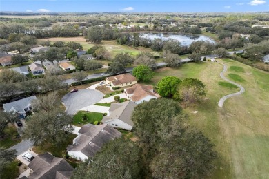 Simply PERFECT in location and design! Situated on a tranquil on Plantation Golf Club in Florida - for sale on GolfHomes.com, golf home, golf lot