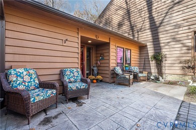 Enjoy easy waterfront living in this beautifully updated on Brandermill Country Club in Virginia - for sale on GolfHomes.com, golf home, golf lot