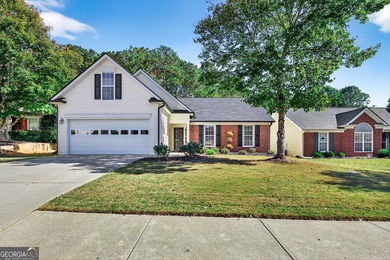 Welcome to this charming 3 bedroom, 2 bath ranch home with a on Summergrove Golf Club in Georgia - for sale on GolfHomes.com, golf home, golf lot