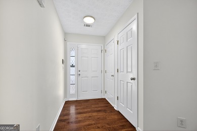 Welcome to this charming 3 bedroom, 2 bath ranch home with a on Summergrove Golf Club in Georgia - for sale on GolfHomes.com, golf home, golf lot