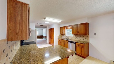 Tucked in a quiet cul-de-sac near the golf course at Tiara Rado on Tiara Rado Golf Course in Colorado - for sale on GolfHomes.com, golf home, golf lot