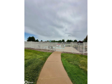 FREE LIFETIME GREEN FEES!!!!!.... LOCATED IN A WONDERFUL on Spirit Hollow Golf Course in Iowa - for sale on GolfHomes.com, golf home, golf lot