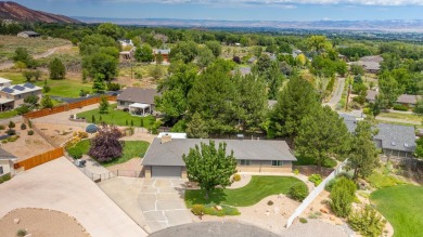 Tucked in a quiet cul-de-sac near the golf course at Tiara Rado on Tiara Rado Golf Course in Colorado - for sale on GolfHomes.com, golf home, golf lot