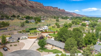 Tucked in a quiet cul-de-sac near the golf course at Tiara Rado on Tiara Rado Golf Course in Colorado - for sale on GolfHomes.com, golf home, golf lot