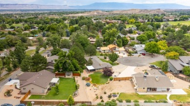 Tucked in a quiet cul-de-sac near the golf course at Tiara Rado on Tiara Rado Golf Course in Colorado - for sale on GolfHomes.com, golf home, golf lot