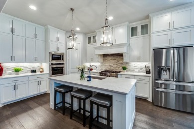 Welcome to this STUNING 4-bedroom, 4.5-bath home nestled in the on The Tribute At the Colony in Texas - for sale on GolfHomes.com, golf home, golf lot