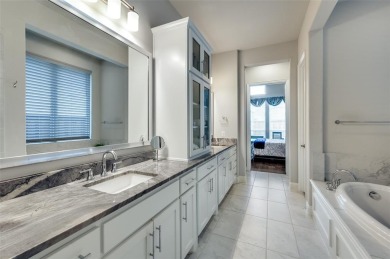 Welcome to this STUNING 4-bedroom, 4.5-bath home nestled in the on The Tribute At the Colony in Texas - for sale on GolfHomes.com, golf home, golf lot