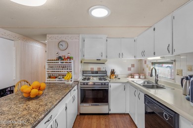 Mountain views, privacy, land ownership, and ideal snowbird on Tucson Estates Golf Course in Arizona - for sale on GolfHomes.com, golf home, golf lot