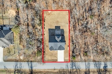 Explore this better-than-new home. Situated on a FLAT 0.25-acre on Bella Vista Country Club - Highlands in Arkansas - for sale on GolfHomes.com, golf home, golf lot