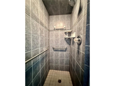 This 3-bedroom, 2-bath block home in Citrus Springs is exactly on Citrus Springs Country Club in Florida - for sale on GolfHomes.com, golf home, golf lot