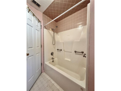 This 3-bedroom, 2-bath block home in Citrus Springs is exactly on Citrus Springs Country Club in Florida - for sale on GolfHomes.com, golf home, golf lot